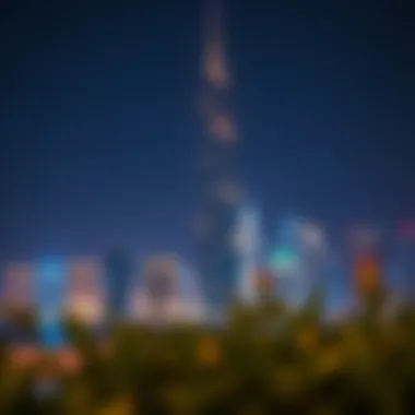 Illuminated Creek Tower Against Dubai Skyline Night view of Creek Tower with city skyline