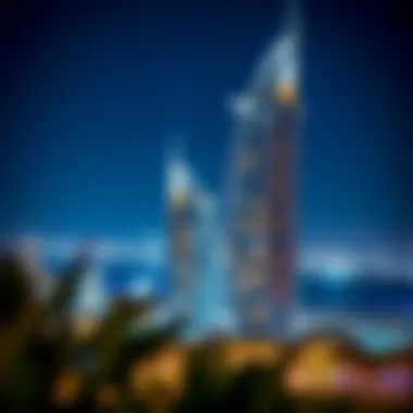 Palm Tower 1 Illuminated at Night Night illumination of Palm Tower 1 against Dubai skyline