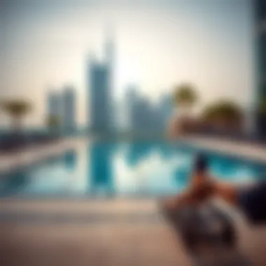 Luxurious swimming pool area with city skyline in the background